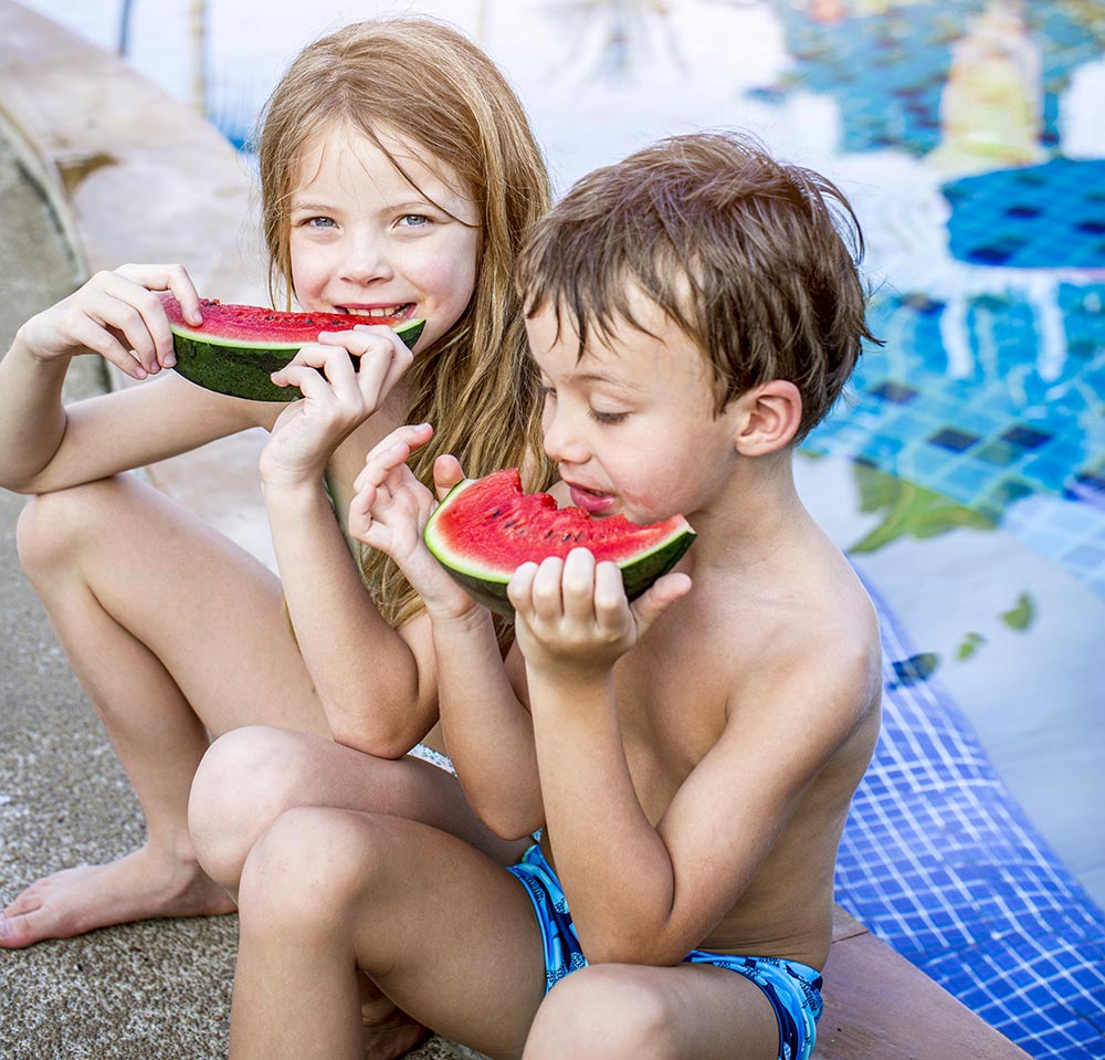 Children eat watermelon