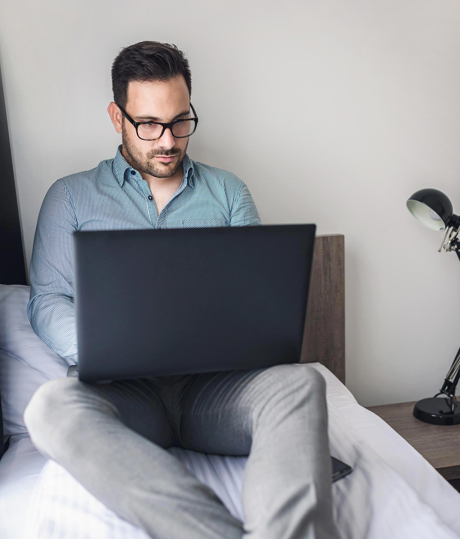 man laptop bed man laptop bed