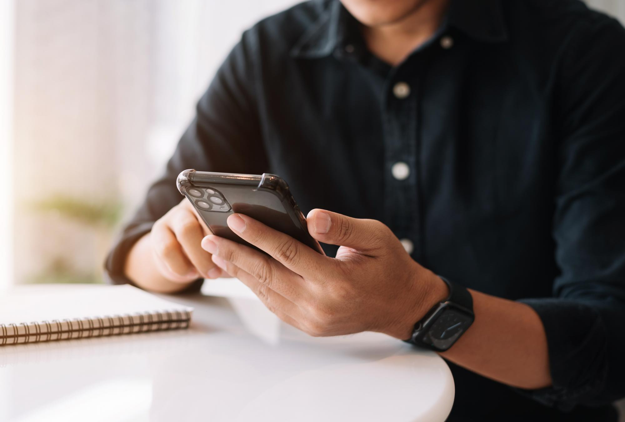 male-use-smartphones-mobile-payments-online-shopping-omni-channels-cafe-morning